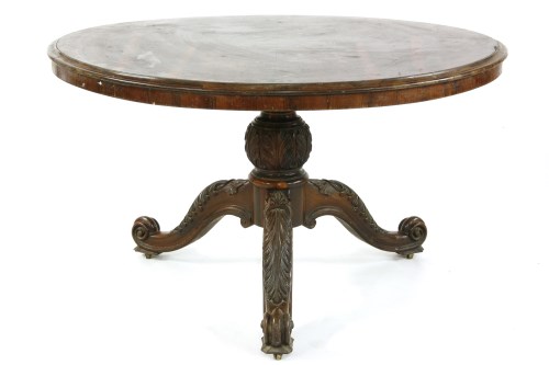 Lot 314 - A mid 19th century rosewood tilt top dining table