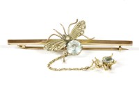 Lot 22 - A gold blue paste stone moth and spider bar brooch