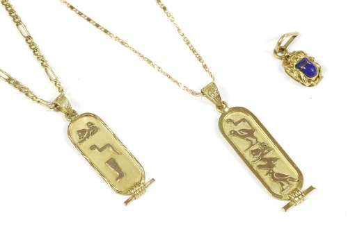 Lot 11 - Two Egyptian hieroglyphics cartouche pendants