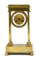 Lot 120 - A small early 19th century French gilt portico clock