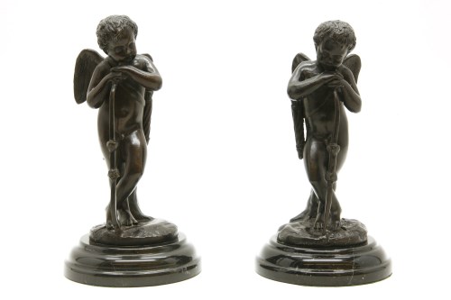 Lot 180 - A pair of bronzed figures of cherubs