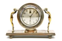 Lot 132 - A Smith's electric clock in a copper and brass case