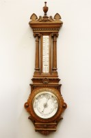 Lot 263 - A late 19th century large oak cased aneroid barometer