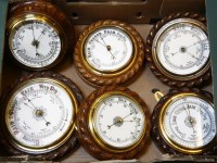Lot 202 - A 20th century oak cased aneroid barometer