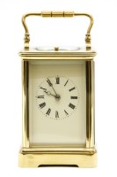 Lot 138 - An early 20th century repeating brass carriage clock