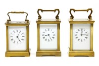 Lot 284 - Three early 20th century brass carriage clocks