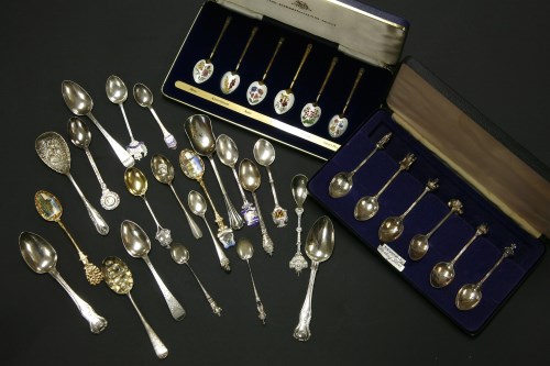 Lot 102 - An assortment of silver and silver-plated spoons