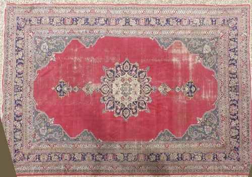 Lot 383 - A large 19th century wine ground carpet