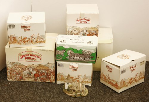 Lot 207 - A collection of miniature model houses