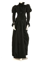 Lot 1318 - A Victorian black silk dress consisting of a bodice