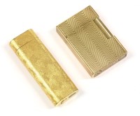 Lot 1488 - A gold-plated Cartier cigarette lighter