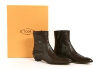 Lot 1384 - A pair of Tod's dark brown leather 'Corral zip bootie' ankle boots