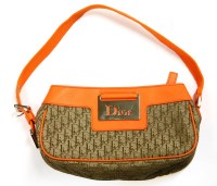 Lot 1148 - A Christian Dior canvas and orange leather shoulder bag