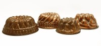 Lot 204 - Four copper jelly moulds