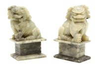 Lot 124 - A pair of Chinese soapstone temple dogs