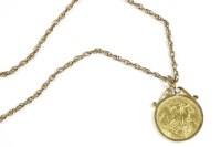 Lot 11 - A 1904 sovereign in a 9ct gold mount on a Prince of Wales chain