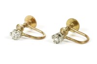 Lot 16 - A pair of single stone cushion cut and old Swiss cut diamond screw back earrings