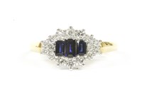 Lot 2 - An 18ct gold sapphire and diamond cluster ring