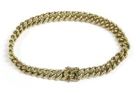 Lot 28 - A Continental yellow metal hollow curb link bracelet