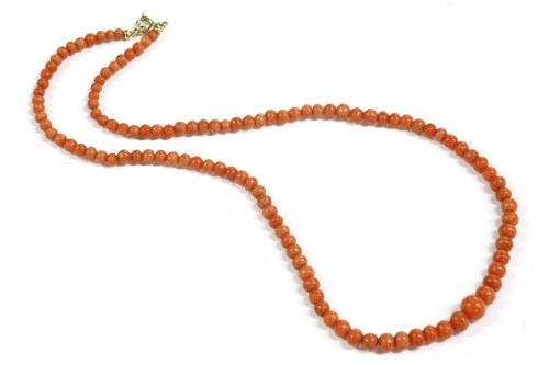 Lot 40 - A single row graduated coral bead necklace