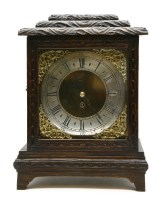 Lot 230 - An oak cased bracket clock