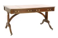 Lot 417 - A reproduction mahogany writing table