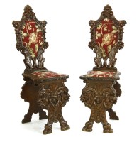 Lot 382 - A pair of Northern European hall chairs