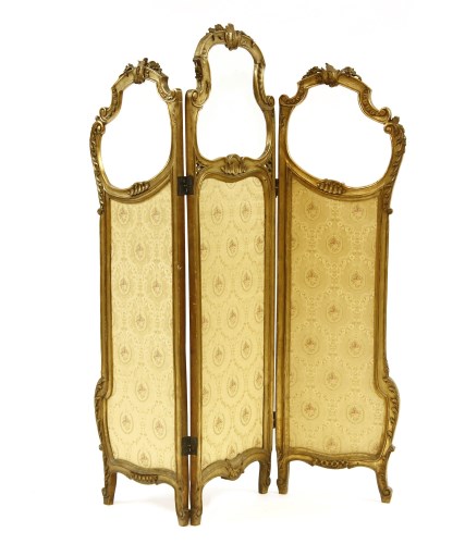 Lot 418 - A gilt three fold dressing screen