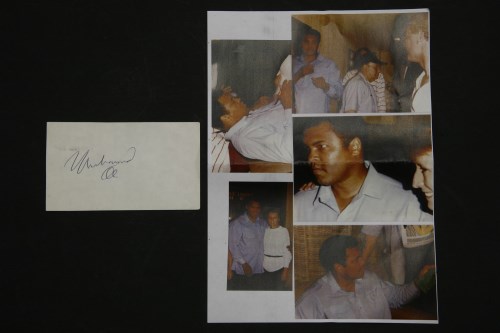Lot 76 - A Muhammed Ali signature on white paper