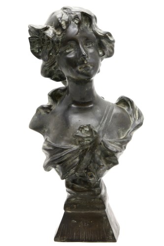 Lot 138 - An Art Nouveau style bronze bust of a young woman