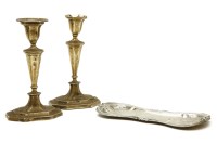 Lot 95 - A pair of hallmarked silver candlesticks