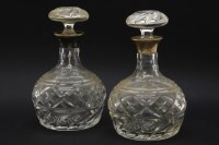 Lot 231 - A pair of cut glass decanters