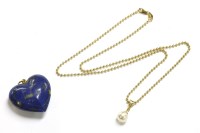 Lot 31 - A gold single diamond and cultured pearl drop pendant