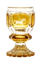 Lot 110 - A bohemian engraved yellow flashed glass goblet (Pokal)