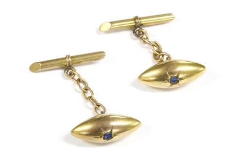 Lot 1 - A pair of Edwardian gold single stone sapphire torpedo chain links