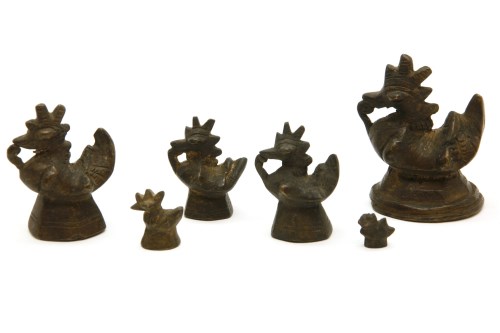Lot 69 - A collection of six Opium weights