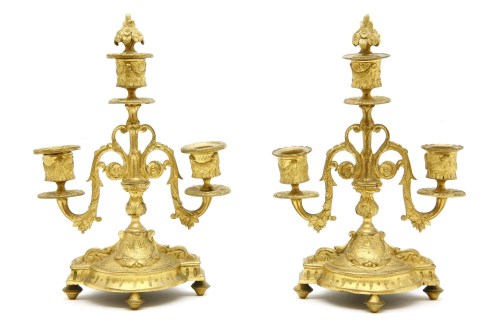 Lot 272 - A pair of three branch candelabra
