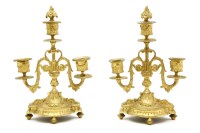 Lot 272 - A pair of three branch candelabra