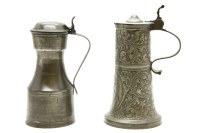 Lot 219 - Two pewter and lidded jugs