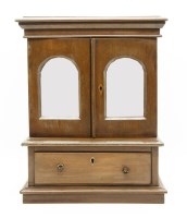 Lot 257 - A table top cabinet with mirrored doors