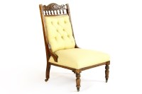 Lot 376A - A Victorian walnut button upholstered nursing chair