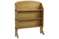Lot 415 - An Arts and Crafts oak open bookcase