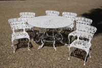 Lot 586 - A large white painted garden table