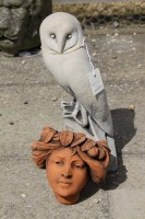 Lot 603 - A life size cast stone figure of a Barn owl
