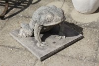 Lot 604 - A large cast stone garden sculpture of a toad resting on a square plinth