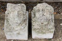 Lot 610 - A pair of cast stone corbels of a French lady and gentleman