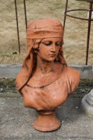 Lot 616 - A bust of a girl in headdress after an original by Pugi