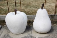 Lot 618 - A cast stone contemporary sculpture of a pear