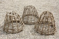 Lot 623 - A set of three hazel cloches