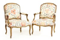 Lot 509 - A pair of Louis XVI design beech wood fauteuils